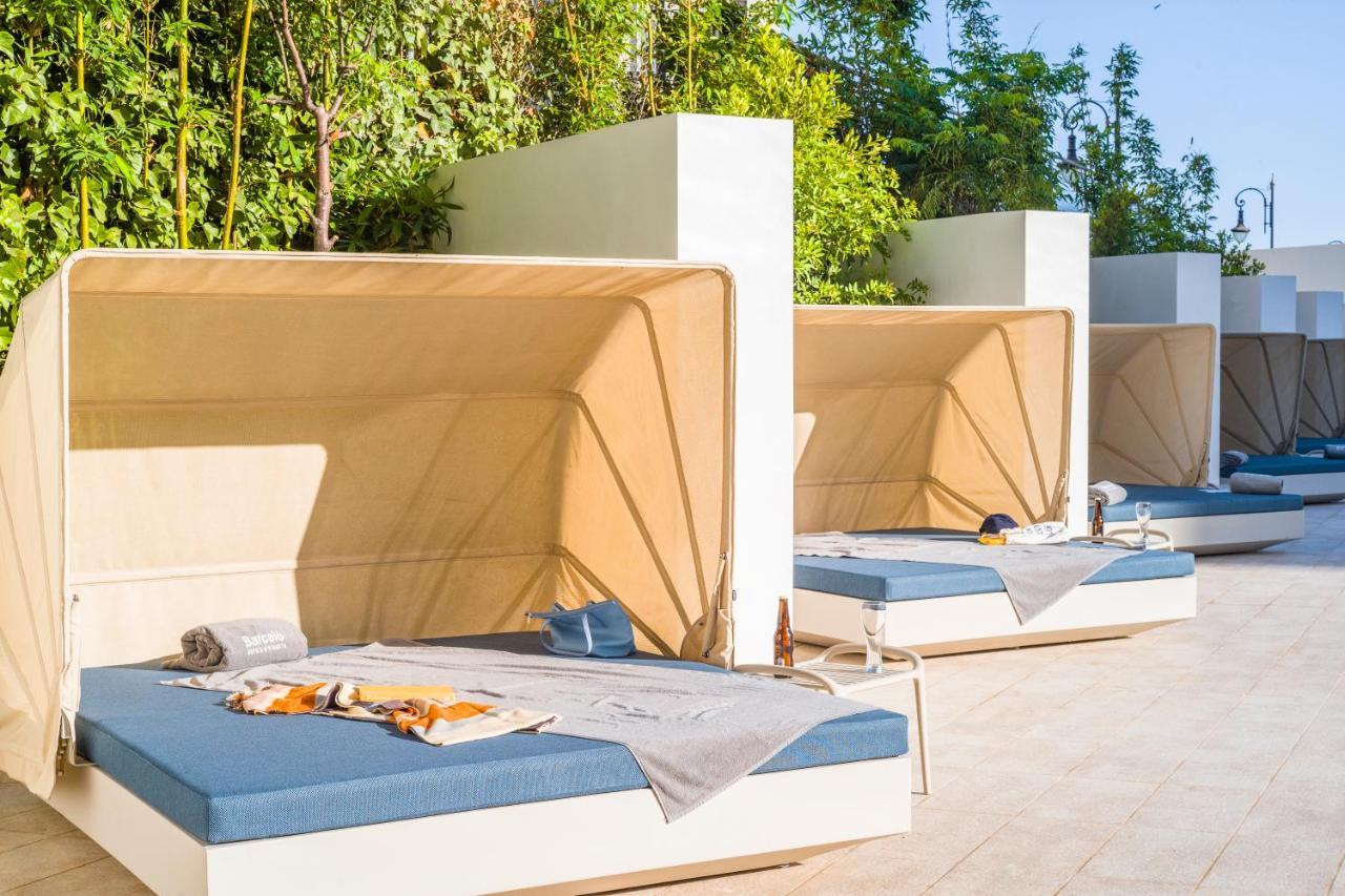 Barcelo Tanger 호텔 외부 사진 Cabanas at the pool